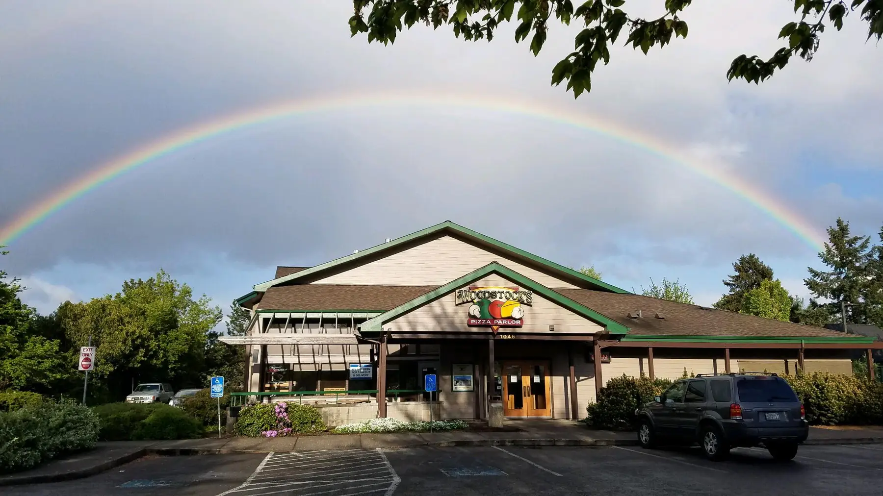 A full rainbow over the Woodstock's building on NW Kings Blvd