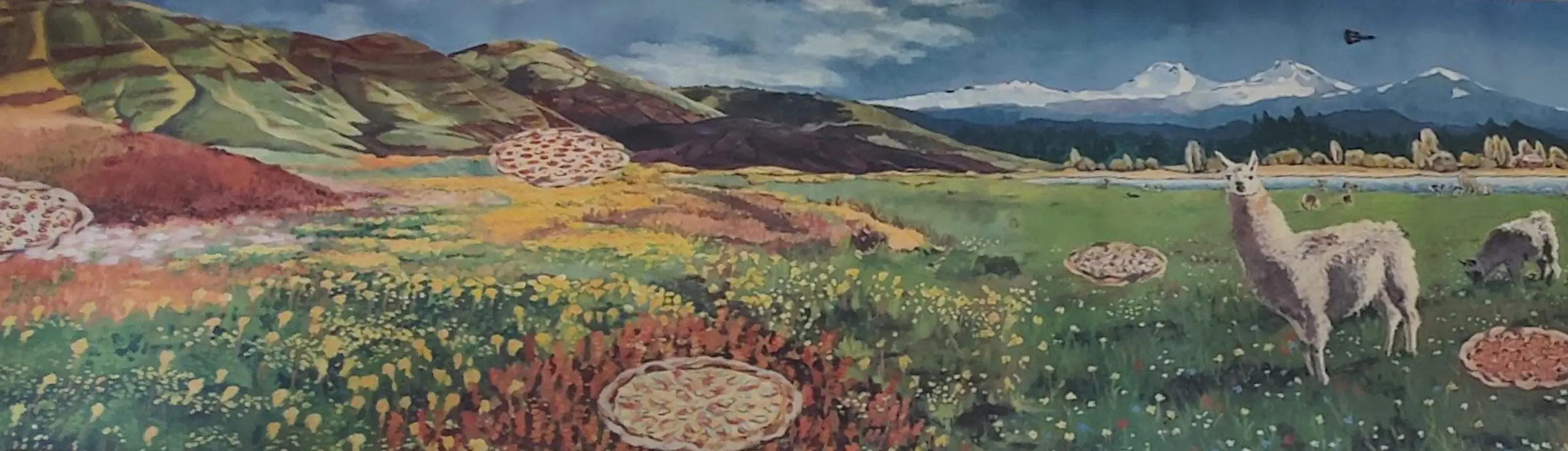 Painted mural: colourful hills and wildflower fields with pizzas lying in them, snowy mountains, a river and two llamas